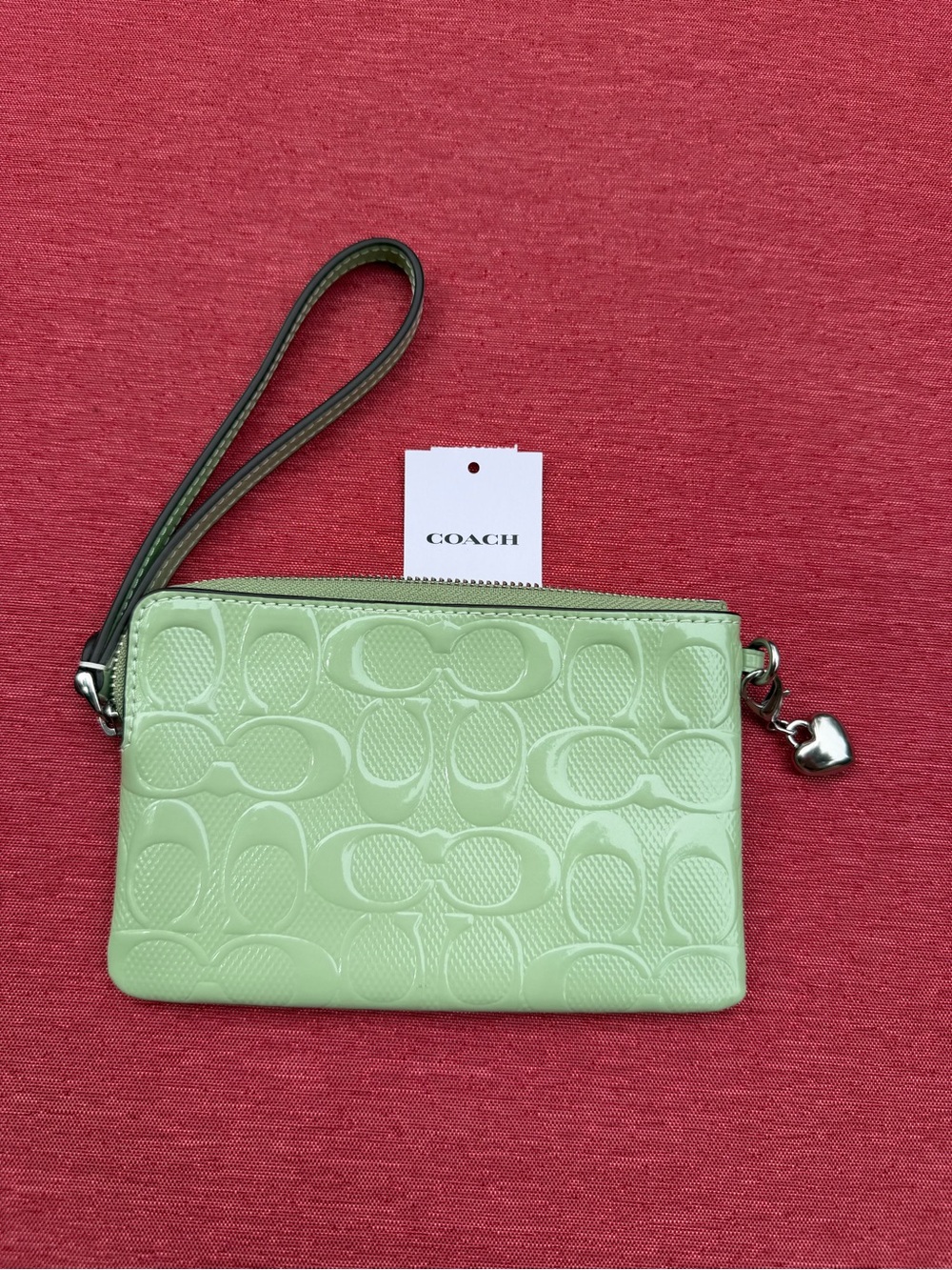 Coach NWT Embossed Signature Wristlet in Light Green $110 Gold Rainbow Key Tag - Picture 2 of 3